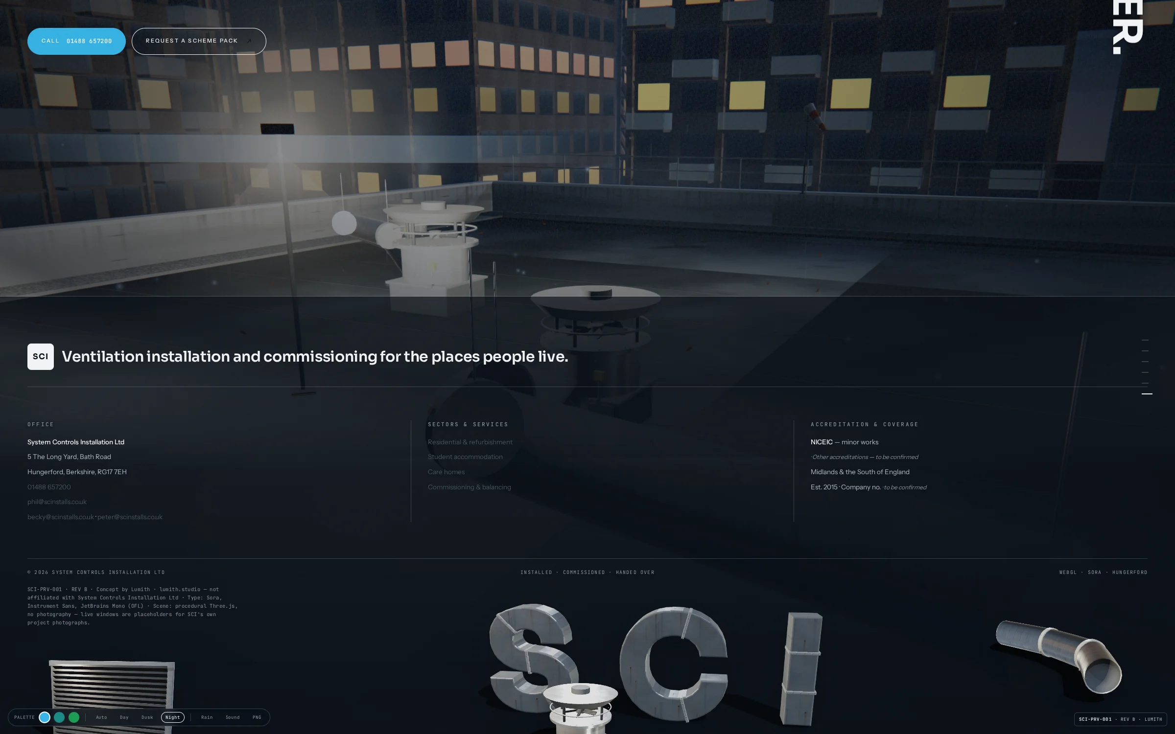 Night by the office: lit flats, lamp pools, the wordmark in relief